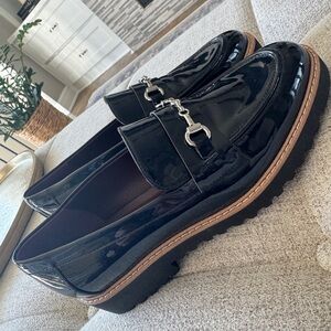 Franco Sarto Shiny Black Loafers with Silver Buckle